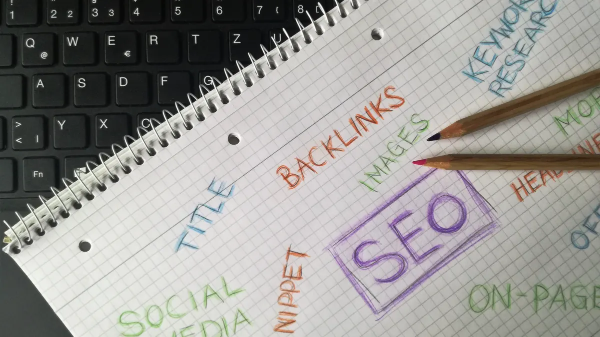 Notebook with SEO and keyword research notes