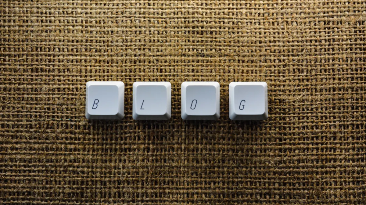 How to automate a blog editorial calendar with AI — Close-up of Individual Keyboard Keys Making a Word "Blog"