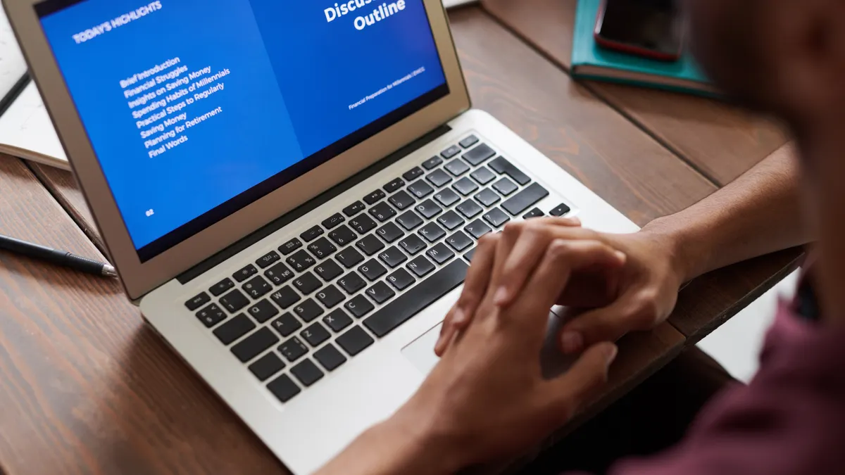 Laptop screen showing a discussion outline
