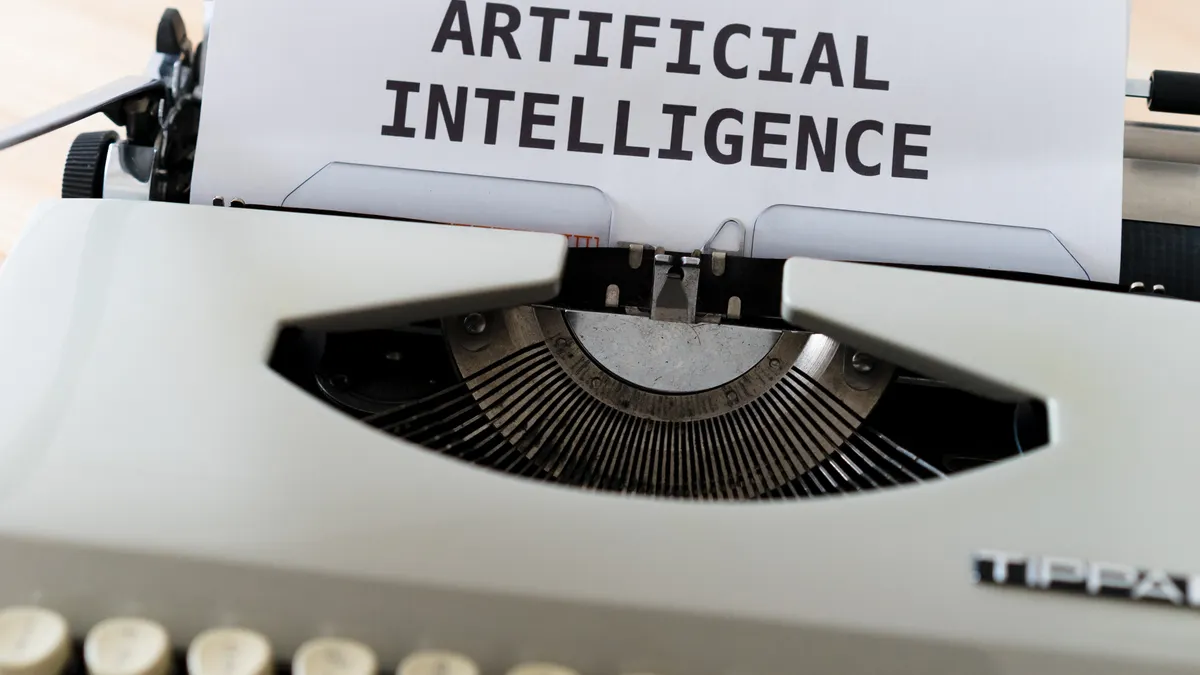 typewriter page reading ARTIFICIAL INTELLIGENCE